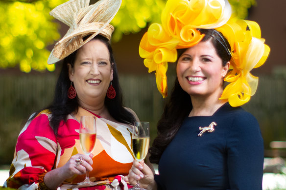 All frocked up ... Jo Eltringham (left) and Doris Jovic warm up for their Melbourne Cup party.