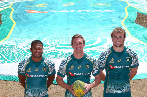 Filipo Daugunu, Dane Haylett-Petty and Harry Wilson at the unveiling of the Wallabies' Indigenous jersey on Wednesday.