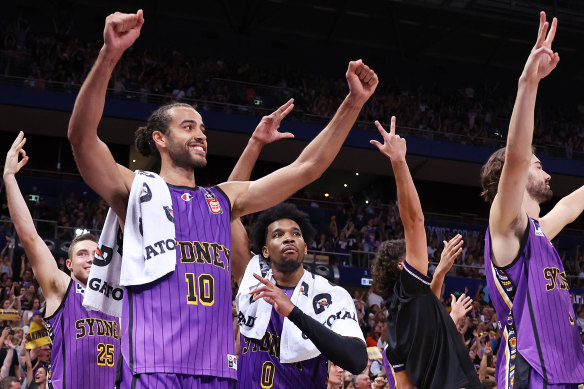 The Kings celebrate their game-three win on Friday night.