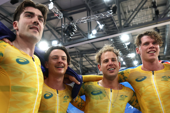 Australia’s team pursuit riders Oliver Bleddyn, Sam Welsford, Conor Leahy and Kelland O’Brien celebrate gold.