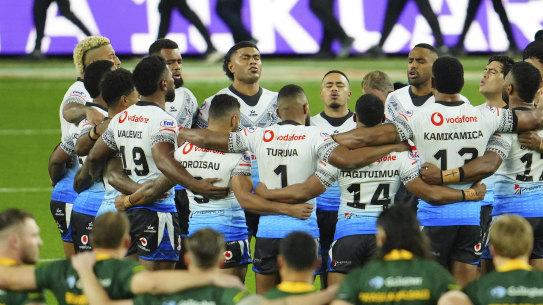 Fiji’s players sing a prayer before the start of their Rugby League World Cup match against Australia.