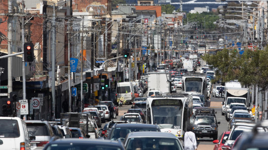 Trams are brought to a standstill in the bottleneck of Sydney Road.