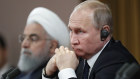 Russian President Vladimir Putin, right, and Iranian President Hassan Rouhani attend a news conference after their talks in the Bocharov Ruchei residence in the Black Sea resort of Sochi, Russia, Thursday, Feb. 14, 2019. Putin is hosting the leaders of Turkey and Iran for talks about a Syria peace settlement. (Sergei Chirikov/Pool Photo via AP)