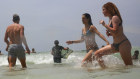 Bathers take refuge from the heat at Maroubra Beach in Sydney where temperatures topped 41 degrees.