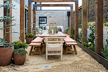 Moving into the courtyard, the judges spirits remained high. Marty was fawning over the arbor. 