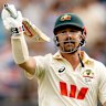 Travis Head raises his bat after his stunning knock in Perth.