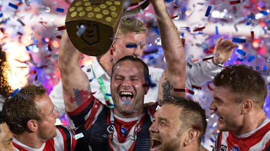 Boyd Cordner lifts the trophy.