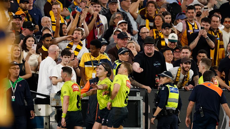 Alleged MCG nacho-thrower faces assault charges after Hawthorn, Brisbane match turned ugly