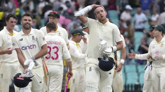 England’s not out duo James Anderson and Stuart Broad walk off at the end of their Ashes Test against Australia in Sydney.