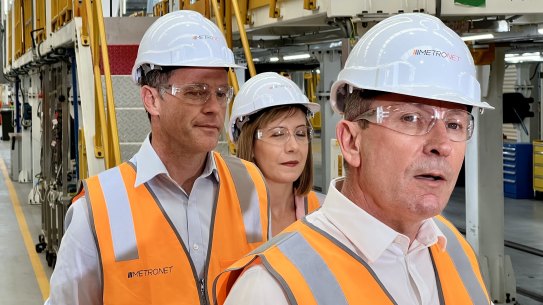 Follow that leader: Chris Minns with WA Premier Mark McGowan in December, inspecting his state’s railcar manufacturing.