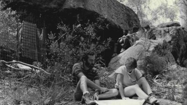 Rock art conservationists in 1985 outside Bull Cave nestled in a patch of bushland near Campbelltown.