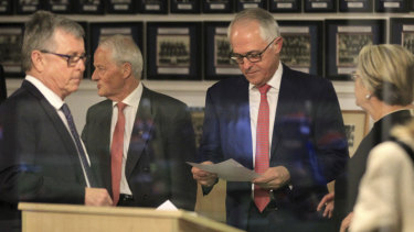 New order: Former prime minister Malcolm Turnbull with NSW party president Philip Ruddock on Monday night.