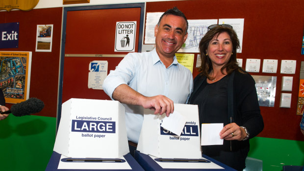 Incumbent Member for Monaro John Barilaro voting at Jerrabomberra Public School with wife Deanna on Saturday.