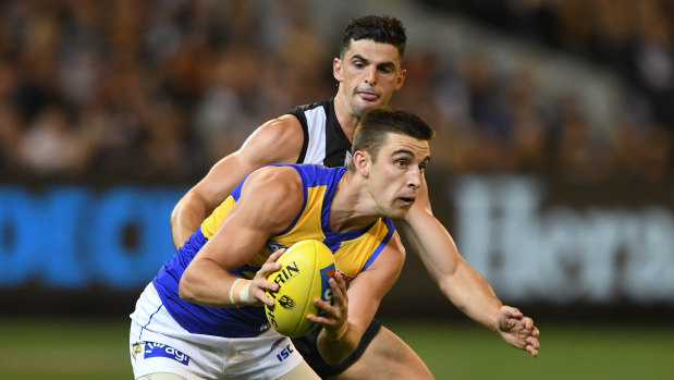 Eagle Elliot Yeo outguns Magpie Scott Pendlebury.