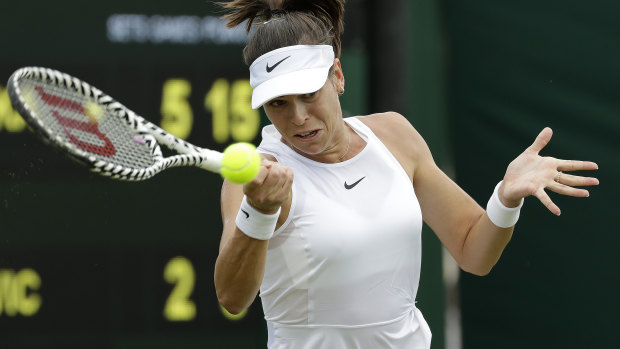 Australia's Ajla Tomljanovic returns to Belarus' Victoria Azarenka at Wimbledon on Wednesday.