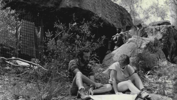 Rock art conservationists in 1985 outside Bull Cave nestled in a patch of bushland near Campbelltown.