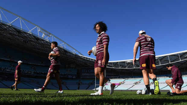 Felise Kaufusi (centre) joins his teammates at ANZ Stadium on Tuesday ahead of this week's Origin match in Sydney.