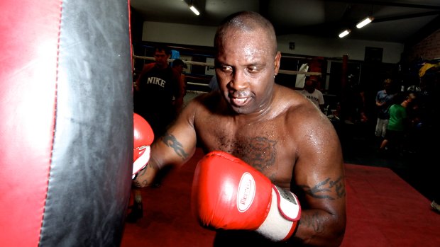 Helping hand: UK two-time world champion boxer Benn at the Blacktown PCYC, where he volunteered with local youth in 2013.