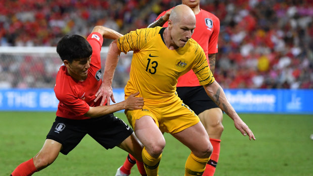 Injury cloud: Socceroos star Aaron Mooy is not certain to play in the Asian Cup but has been named in coach Graham Arnold's 23-man squad anyway.