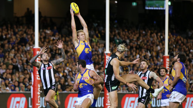 High-flying Eagle Oscar Allen marks against Collingwood in round three this year.