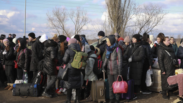 People fleeing Ukraine at the border crossing in Palanca, Moldova. 