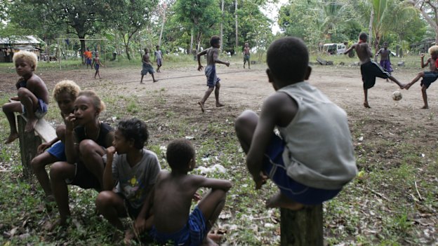 Youngsters playing football in the villiage of Kakabona, just outside Honiara.