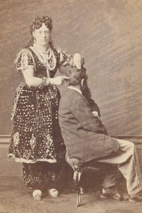 Madame Sibly, Phrenologist and Mesmerist, 1870s, by James E. Bray, albumen silver carte de visite photograph, courtesy of the National Portrait Gallery.