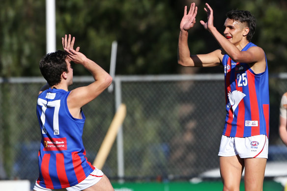 Exciting NGA prospect Jamarra Ugle-Hagan (right) is tied to the Western Bulldogs.  