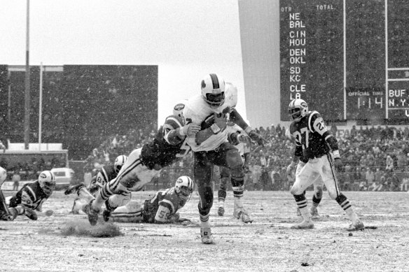 Then Buffalo Bills running back OJ Simpson leaves the New York Jets defence behind as he breaks loose for a touchdown.