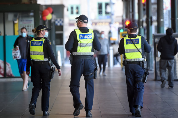 Officers patrolling the streets of Melbourne on Sunday.