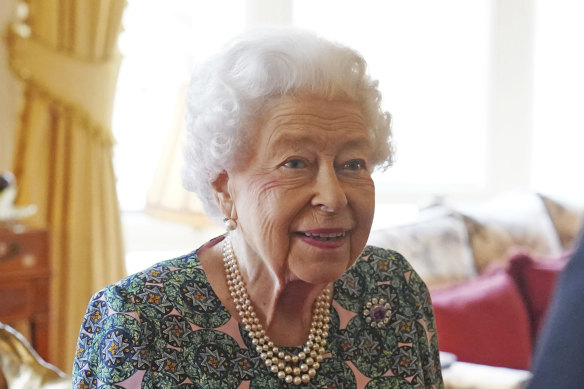 “As you can see, I can’t move,” the Queen said at a meeting in Windsor Castle last week when this photo was taken.