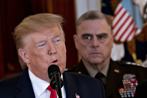  General Mark Milley listens as president Donald Trump discusses an Iranian air strike, January 8, 2020. 