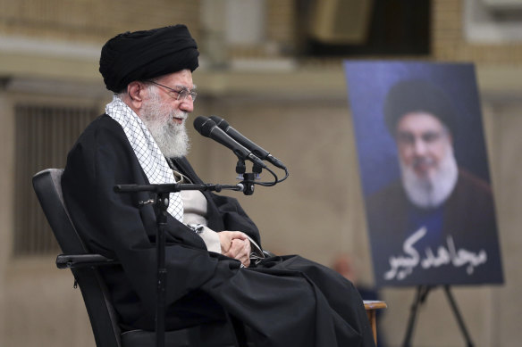 Supreme Leader Ayatollah Ali Khamenei listens to a speaker in a meeting in Tehran on Wednesday.