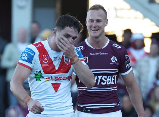 Dragons five-eighth Kyle Flanagan is chipped by Manly’s daly Cherry-Evans after being sent for a concussion test.