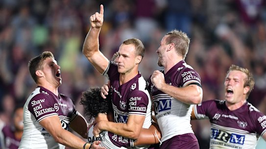 Daly Cherry-Evans celebrates his match-winning field goal against the Warriors.
