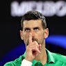 Novak Djokovic of Serbia reacts against Botic van de Zandschulp of the Netherlands.