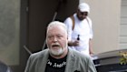 Kyle Sandilands addresses media outside his Vaucluse home on Tuesday.