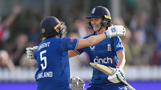 England captain Heather Knight celebrates the crucial victory with Kate Cross.
