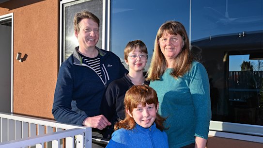 Ruth Giles at her three-bedroom apartment with her husband Rob and children Nova and Peter.