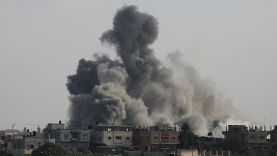Smoke rises from an explosion caused by Israeli airstrikes on the border between Egypt and Rafah, the Gaza Strip. 