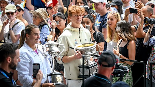 Reigning champions Aryna Sabalenka and Jannik Sinner bring the trophies along to the official 2025 draw ceremony.