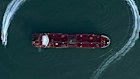 Boats from Iran’s Revolutionary Guard circle the British-flagged oil tanker Stena Impero days after it was seized in the Strait of Hormuz in 2019.