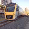 Gold Coast and Airport lines running again after grass fire causes long delays