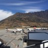 On the ground in Queenstown, New Zealand, with The Remarkables Range in the background.