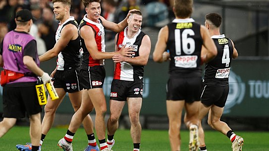 Jack Higgins and teammates celebrate a goal.