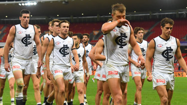 Carlton trudge off Giants Stadium after their latest humiliation on Sunday.