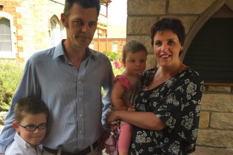 Peta Hickey (right) with her husband Richard and their children.