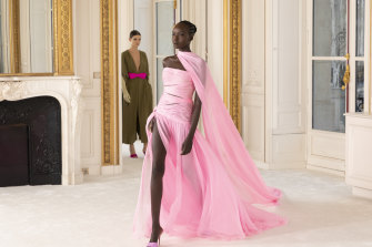 Australian model Ajok Madel walks in the Valentino haute couture, spring/summer 2022 show in Paris.