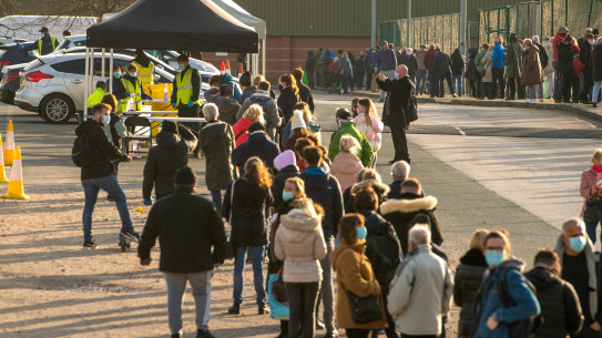 Hundreds of people without COVID-19 symptoms queued in Liverpool to get tested.