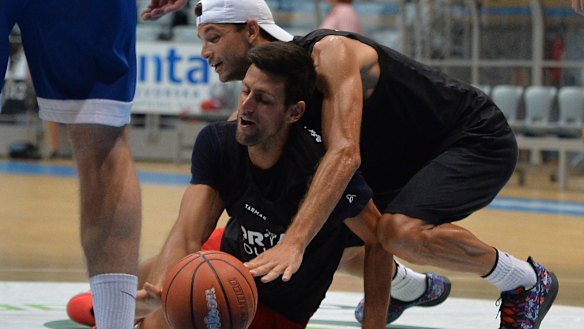 Grigor Dimitrov and Novak Djokovic warm up with a game of basketball ahead of the Adria Tour event in Croatia, three days before the former revealed he has tested positive for COVID-19